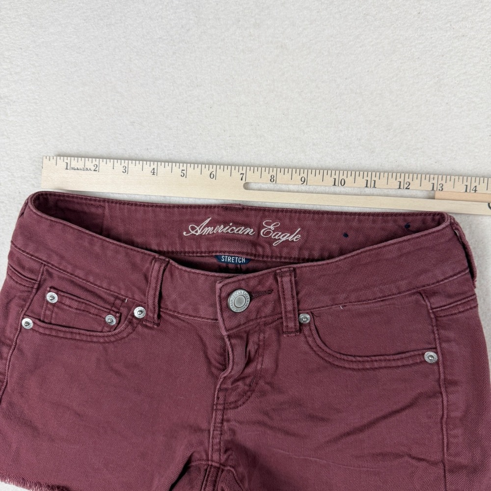 American Eagle Stretch Denim Shorts Burgundy Maroon Frayed Hem Size 0 Low Rise - Picture 2 of 7